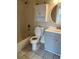 Standard bathroom with white cabinets, tile flooring, and a shower-tub combo at 6232 Bayside Key Dr, Tampa, FL 33615