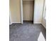 Bedroom with spacious closet and carpeted floor at 6232 Bayside Key Dr, Tampa, FL 33615