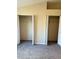 Bedroom with double closets and shelving at 6232 Bayside Key Dr, Tampa, FL 33615