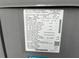 Close-up of an HVAC Label showing model, serial number, and electrical characteristics at 6232 Bayside Key Dr, Tampa, FL 33615