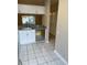 Kitchen with stainless steel appliances and white cabinets at 6232 Bayside Key Dr, Tampa, FL 33615
