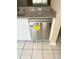 Stainless steel dishwasher with energy guide information set below granite countertops at 6232 Bayside Key Dr, Tampa, FL 33615