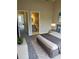 Comfortable bedroom with a glimpse into a bathroom, showcasing a private and convenient layout at 6232 Bayside Key Dr, Tampa, FL 33615