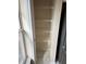 A pantry with adjustable wire shelves with a nearby window allowing natural light at 6232 Bayside Key Dr, Tampa, FL 33615