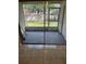 Screened-in patio offering pleasant outdoor views at 6232 Bayside Key Dr, Tampa, FL 33615