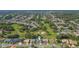 Aerial view of the house and surrounding neighborhood, highlighting its location at 10328 Henderson St, Spring Hill, FL 34608