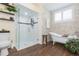 Modern bathroom with walk-in shower and freestanding tub at 10328 Henderson St, Spring Hill, FL 34608