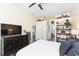 Serene bedroom with ensuite bathroom and ample closet space at 10328 Henderson St, Spring Hill, FL 34608