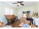 Bedroom with a drafting table and plenty of space for storage and organization at 10328 Henderson St, Spring Hill, FL 34608