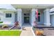 Inviting front entryway with double doors and landscaping at 10328 Henderson St, Spring Hill, FL 34608