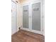 Walk-in pantry with double doors and frosted glass at 10328 Henderson St, Spring Hill, FL 34608