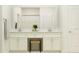 Double vanity bathroom with white cabinets and a large mirror at 11869 Sparkling Topaz Cv, Parrish, FL 34219