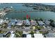 Aerial view of waterfront home with private dock and boat access at 16124 4Th E St, Redington Beach, FL 33708