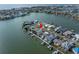 Aerial view of waterfront home with private dock and boat lift at 16124 4Th E St, Redington Beach, FL 33708