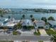 Aerial view of waterfront home and neighborhood at 16124 4Th E St, Redington Beach, FL 33708