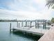 Private dock and boat lift providing convenient water access at 16124 4Th E St, Redington Beach, FL 33708