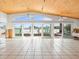 Spacious living area with vaulted ceilings, tile floors and water views at 16124 4Th E St, Redington Beach, FL 33708
