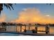 Stunning sunset over the water, with private dock and pool at 16124 4Th E St, Redington Beach, FL 33708