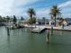 Waterfront property with private dock and lush landscaping at 16124 4Th E St, Redington Beach, FL 33708
