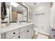 Bathroom with gray vanity, toilet and shower/tub combo at 216 S Westland Ave # 4, Tampa, FL 33606