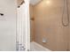 Simple bathroom with shower/tub combo and neutral tile at 216 S Westland Ave # 4, Tampa, FL 33606