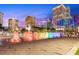 Colorful illuminated fountain at night in a city square at 216 S Westland Ave # 4, Tampa, FL 33606