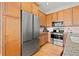 Modern kitchen with stainless steel appliances and light wood cabinets at 216 S Westland Ave # 4, Tampa, FL 33606