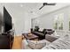 Light and airy living room with hardwood floors and a comfortable sofa at 216 S Westland Ave # 4, Tampa, FL 33606