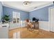Home office with hardwood floors and built-in shelving at 216 S Westland Ave # 4, Tampa, FL 33606