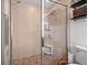 Large walk-in shower with neutral tile and glass enclosure at 216 S Westland Ave # 4, Tampa, FL 33606