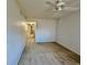 Bedroom with carpet flooring and access to hallway at 2226 Switzerland Way # 30, Clearwater, FL 33763