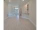 Bright and airy living room with tile flooring and an open floor plan at 36141 Welsh Glade Rd, Dade City, FL 33525