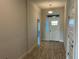 Spacious entryway with tile flooring and neutral color palette at 36159 Welsh Glade Rd, Dade City, FL 33525