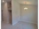 A bright and airy dining room with tile flooring and an adjacent pantry at 36179 Welsh Glade Rd, Dade City, FL 33525