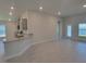 Bright and spacious living room with tile flooring at 36179 Welsh Glade Rd, Dade City, FL 33525