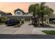 Two-car garage townhome with landscaping and driveway at 521 Harbor Ridge Dr, Palm Harbor, FL 34683