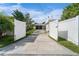 Private gated driveway leading to the garage at 601 42Nd Ne Ave, St Petersburg, FL 33703