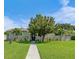 Charming single-story home with a well-manicured lawn and walkway at 601 42Nd Ne Ave, St Petersburg, FL 33703