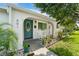 Inviting front porch with rocking chairs and landscaping at 601 42Nd Ne Ave, St Petersburg, FL 33703
