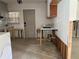 Partially updated kitchen features new countertops, sink, faucet, and cabinets, with exposed framework visible at 601 42Nd Ne Ave, St Petersburg, FL 33703