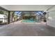 Screened-in pool area with a spacious concrete deck at 601 42Nd Ne Ave, St Petersburg, FL 33703