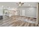 Open concept living room, kitchen, and high ceilings at 6103 Fairway Dr, Ridge Manor, FL 33523
