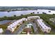 Waterfront community with pool, pond, and multiple condo buildings at 6450 Shoreline Dr # 9203, St Petersburg, FL 33708