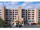 Three-story condo building, ample parking, and attractive landscaping at 6450 Shoreline Dr # 9203, St Petersburg, FL 33708