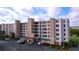 Condo building exterior with parking and landscaping; great waterfront views at 6450 Shoreline Dr # 9203, St Petersburg, FL 33708