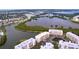 Condo complex nestled on a waterfront property with lush landscaping at 6450 Shoreline Dr # 9203, St Petersburg, FL 33708