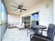 Relaxing screened balcony with outdoor furniture and scenic views at 6450 Shoreline Dr # 9203, St Petersburg, FL 33708