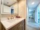 Clean bathroom with vanity, mirror, and white countertop at 6450 Shoreline Dr # 9203, St Petersburg, FL 33708