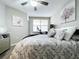 Comfortable bedroom with a queen-size bed and exercise bike at 6450 Shoreline Dr # 9203, St Petersburg, FL 33708