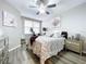 Serene bedroom with a queen bed, nightstands, and large window at 6450 Shoreline Dr # 9203, St Petersburg, FL 33708